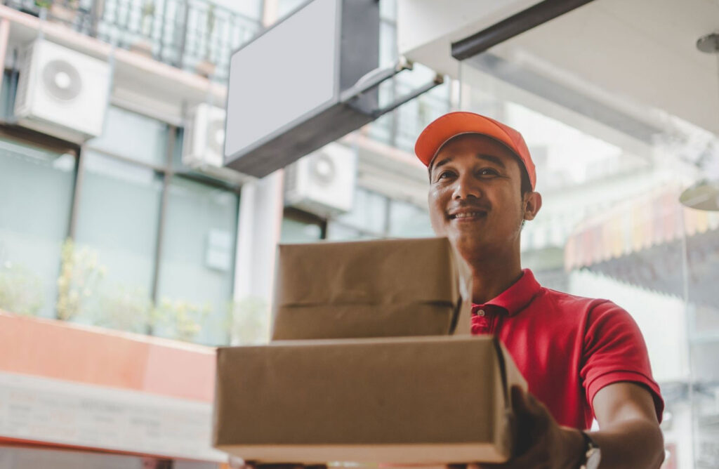 Delivery person providing customer service with a smile